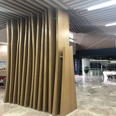 弧形木紋鋁方通與弧形波紋鋁通 現(xiàn)代裝飾材料的創(chuàng)新應(yīng)用